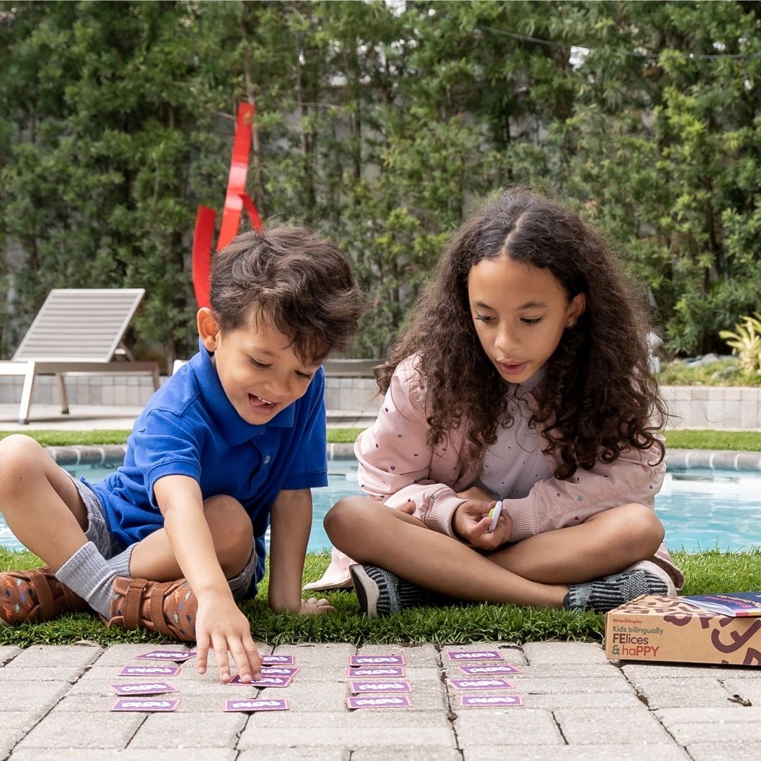 bilingual kids playing Spanish games
